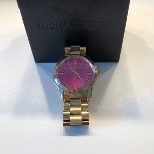 Gold Michael Kors watch with Pink face
